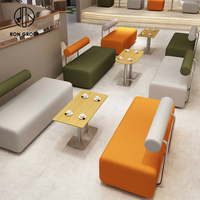 Canapé de restaurant moderne en pierre frittée ronde avec cadre en fer velours, durable, pour café