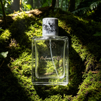 Bouteille de parfum vide en verre transparent de 100 ml avec étiquette personnalisée, paroi épaisse, épaule plate, forme rectangulaire carrée, avec bouchon en marbre