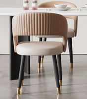 Fauteuil de salle à manger en acier inoxydable de style italien, luxe léger, édition designer moderne et minimaliste pour la maison, nouveau modèle 2026