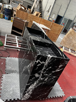 Meuble-lavabo flottant en marbre Nero Marquina avec tiroir, lavabo en pierre naturelle, design moderne et luxueux