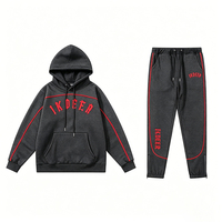 Ensemble de survêtement pour homme en tissu Scuba avec passepoil contrastant, fentes latérales zippées, détails de poignets et chevilles élastiques, comprenant un sweat à capuche oversize et un pantalon de jogging