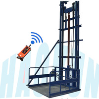 Ascenseur de fret hydraulique électrique avec capacité de 1 tonne et télécommande électrique pour le chargement des marchandises dans les sous-sols et entrepôts