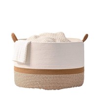 Panier de rangement tissé en corde de coton pour la décoration intérieure moderne fait à la main avec des vêtements jouets couverture sortie d'usine