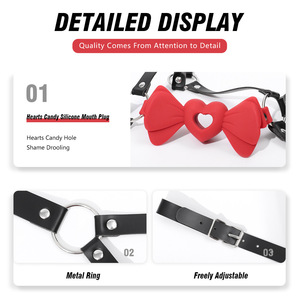 Accessoire de bondage pour adulte en cuir noir avec nœud papillon rouge pour la tête - Product Image 4