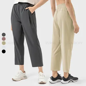 Grosir elegan celana olahraga lari produsen ikat pinggang elastis tinggi Streetwear celana Joger longgar luar ruangan untuk wanita
