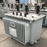 Transformateur abaisseur triphasé immergé dans l'huile S11 300 315 350 400 500 630 800 KVA 10000V 11000V Dyn11 Énergie verte IEC60076