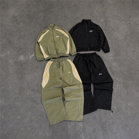 Ensemble de survêtement thermique tricoté personnalisé pour homme en Spandex/Coton, style streetwear, avec veste à col montant et pantalon large, bicolore, pour l'automne