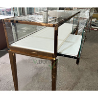 Boutique de bijouterie moderne Design d'intérieur luxe haut de gamme verre vitrine de bijoux comptoir vitrine de bijoux avec lumière