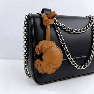 Factory Wholesale Leather Croissant Keychain Simulation Leather Pendant with Horn Bag Buckle for Purse Charm and Car Gift