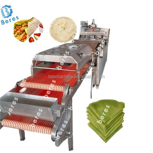 Machine à pain automatique pour la fabrication de tortillas, de crêpes, de chapatis et de roti, avec four de cuisson et système de refroidissement, équipée d'un moteur - Product Image 1
