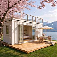 Maison conteneur de luxe extensible à 2 étages, villa modulaire préfabriquée de 40 pieds avec balcon, porte vitrée et terrasse en bois pour hôtel et complexe hôtelier