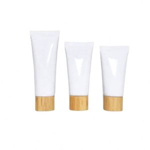 Envase Cosmético en Tubo Exprimible para Limpiador Facial y Mascarilla, Plástico PE con Tapa de Bambú Blanca, Tamaños de 50g-150g, Cuidado de la Piel - Product Image 1