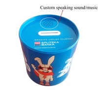 Caliente nuevo diseño de forma ovalada sonido personalizado música moneda banco dinero ahorro caja de lata para los niños