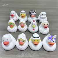 Fabrication chinoise de mignons canards en caoutchouc flottants en vrac, canards de dessin animé en plastique vinyle promotionnels
