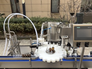 Machine automatique de remplissage et de bouchage de flacons compte-gouttes en verre PLC pour huile/jus/alcool 10-200 ml haute précision - Product Image 5