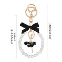 Boutons de manchette en métal style Ins avec nœud perlé, accessoire créatif fait main, porte-clés en cristal Fille de ballet pour toutes les saisons