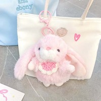 Deux adorables porte-clés en peluche, lapin à pompon et nœud, et lapin à oreilles tombantes couleur crème, joli pendentif de sac, petit cadeau mignon pour jeunes filles