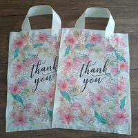 Sacs de remerciement personnalisés Offre Spéciale sacs à provisions en plastique à poignée souple pour vêtements pour magasins de détail