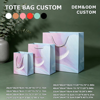 Sacs en carton blanc de luxe en gros, logo imprimé sur mesure, sacs cadeaux pour boutiques de vêtements, chaussures, vente au détail