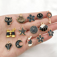 Breloques en émail noir pour la fabrication de bijoux DIY, pendentifs en alliage plaqué or, coquillage, chat, papillon, sirène, étoile, 31 styles