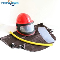 Sand Blast Industries utilise des casques rouges et bleus de protection de sécurité pour le sablage