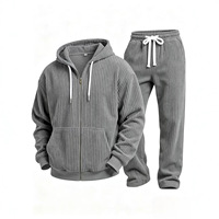 Ensemble décontracté homme automne : veste à capuche tissée unie à manches longues et pantalon de sport, style transfrontalier Europe-Amérique, populaire