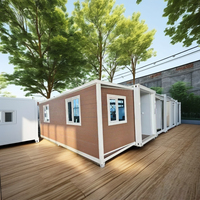 Maison conteneur pliable de luxe Maison capsule de luxe préfabriquée avec terrasse extensible et maison mitoyenne