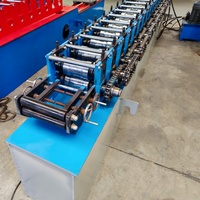 Machine de fabrication de tôles de clôture en acier galvanisé avec écran de confidentialité Machine de formage de tôles de clôture en acier Dura Fence Machinery