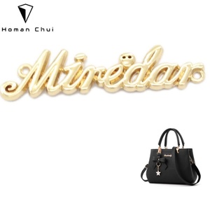 ป้ายโลหะติดแบรนด์ ตัวอักษรสีทอง ราคาโรงงาน รับทำตามแบบ - Product Image 1