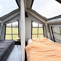 Tente de glamping gonflable de luxe extra large et spacieuse pour 8 à 10 personnes, imperméable et résistante au vent, type cabine.
