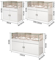 Vitrine de luxe en verre trempé noir mat sur pied pour salon professionnel, présentoir à bijoux avec éclairage LED et rangement