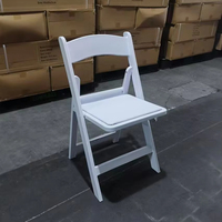 Chaise pliante en résine blanche rembourrée pour les fêtes de mariage, capacité de 800 lb