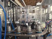Machine de soufflage PET à insertion manuelle, deux cavités, haute production, 380V, 600kN de serrage, pour pots à large ouverture de qualité alimentaire et eau potable