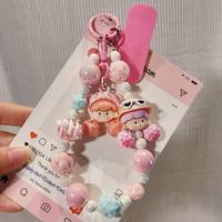 Breloque de téléphone perlée mignonne style doodle, porte-clés, poupée de dessin animé, sangle de téléphone, chaîne créative pour téléphone portable, pendentif décoratif pour filles, vente en gros