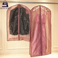 Ensemble de housses de vêtements en organza rose clair anti-poussière de qualité supérieure pour magasin de vêtements