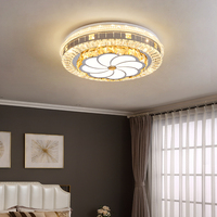 Plafonnier en cristal de luxe bon marché postmoderne simple LED chambre circulaire maison lampe de chambre
