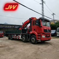 Grue articulée hydraulique montée sur camion Jiangwei SQ560ZB6+1 14T, portée 18,25 m avec flèche de rehaussement sur châssis CLW