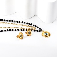 Bijoux de mode personnalisés Oeil du mal Colliers et boucles d'oreilles en acier inoxydable Superposition de perles noires Chaîne Collier Boucles d'oreilles Ensemble
