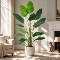 Plante artificielle d'oiseau de paradis faite à la main sans entretien, faux arbre tropical dans un pot noir pour la décoration moderne du salon OEM