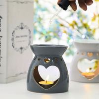 Coeurs Offre Spéciale, brûleur à huile en céramique creux en gros fondeur de cire en céramique lampe chauffante bougies brûleurs d'encens à l'huile essentielle