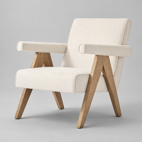Fauteuil en tissu crème pour projet hôtelier et villa, avec accoudoirs et structure en bois, idéal pour salon, chambre et lecture