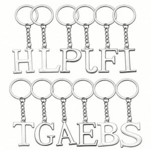 Venta al por mayor de fábrica, se pueden personalizar 26 letras inglesas, accesorios que no se desvanecen, colgante de llavero hueco de acero inoxidable - Product Image 5