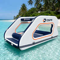 Flotteur gonflable cabine couleur personnalisée avec fenêtres latérales ouvertes, auvent solaire intégré et tapis de relaxation rembourré pour les sorties aquatiques familiales estivales en bord de mer