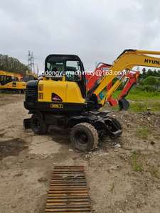 Excavatrice sur pneus Hyundai 60W-7 d'occasion avec moteur et pompe, garantie 1 an pour les machines de construction - Product Image 3
