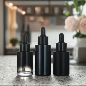 Botella de Vidrio con Gotero de 30 ml, Personalizada en Negro, Naranja y Azul, Multicolor, con Fondo Grueso y Tapa Serigrafiada para Uso Cosmético - Product Image 2