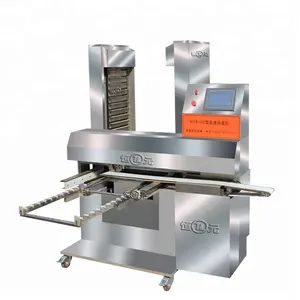 tray arranging machine for food processing equipment