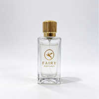 Ensemble d'emballage de parfum de luxe avec logo personnalisé, flacon de parfum en verre transparent de 30/50/100 ml, couvercle doré, boîte cadeau rigide avec poignée et sac fourre-tout