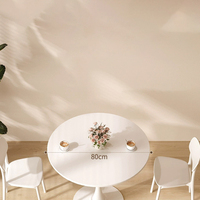 Table basse ronde moderne avec base sur piétement pour salon et coin détente