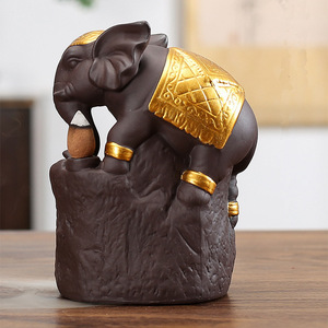 Nuevo quemador de incienso creativo transfronterizo con diseño de elefante dorado y madera de sándalo púrpura para aromaterapia y decoración del hogar. - Product Image 1