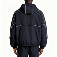 Veste coupe-vent en nylon softshell Gorpcore avec panneaux en mesh, style techwear minimaliste et passepoil contrastant, 260 g/m²